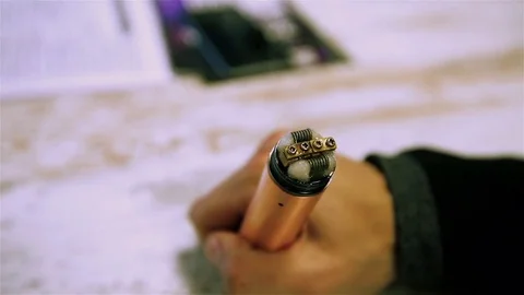 Vape. Heating of coils with a large release of steam. Stock Footage 73178828