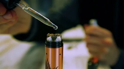 Vape liquid with nicotine for the electronic cigarette. Stock Footage 73178040