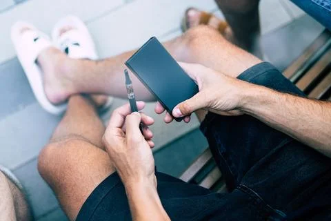 Vape Product Packaging in Hands Stock Photos