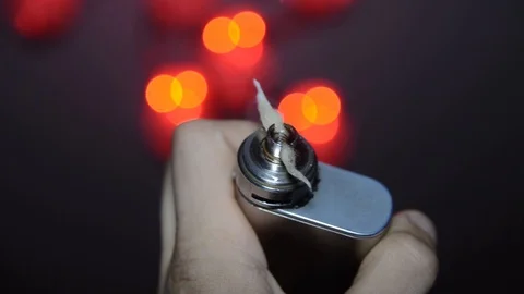 Vape, vapers, cotton, solid red spiral nakalivaetsja Stock Footage 97758066