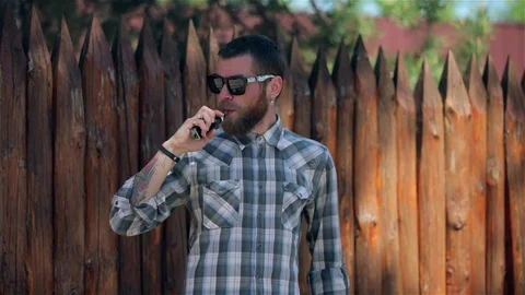 Vaping Bearded Man. 스톡 동영상 75327731