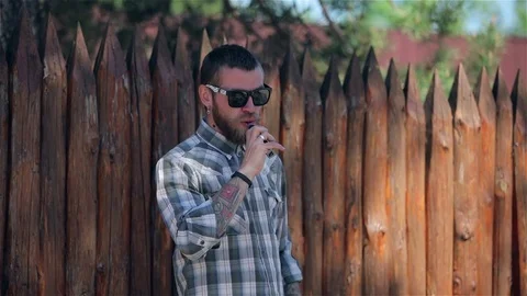 Vaping Bearded Man. Stock Footage 75327747