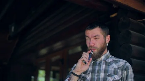 Vaping Bearded Man. Stock Footage 75327749