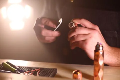 Vaping device mech mod copper surface polish process.Repair and maintenance of Stock Photos