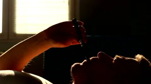 Vaping e cigarette on bed in the morning Stock Footage 47069805