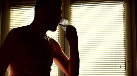 Vaping e cigarette by the blinded window. Stock Footage 47071050