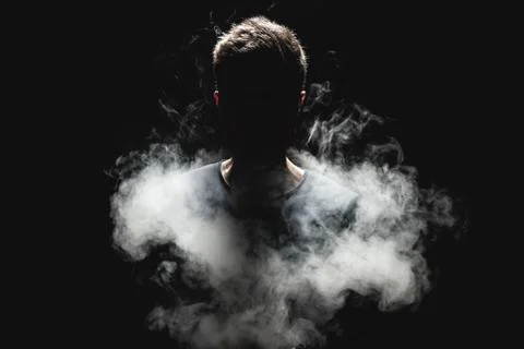 Vaping e-liquid from an electronic cigarette Stock Photos