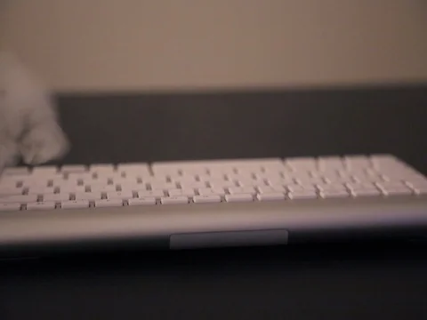 Vaping smoke floating above keyboard Stock Footage 73833354