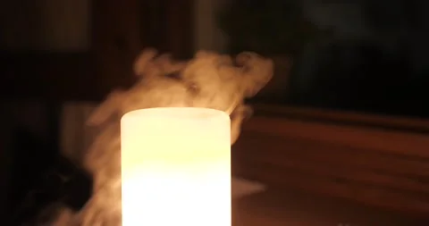 Vapor From Aroma Oil Diffuser Lamp On The Table. Essential Oil Therapy. Stock Footage 164819435