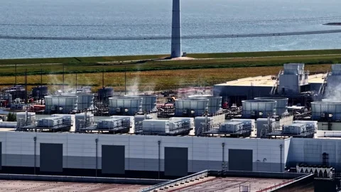 Vapor rising from Data center's cooling system operating in Eemshaven Stock Footage 344430362