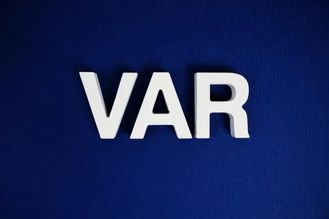 VAR (Video Assistante Referee) alphabet letters on blue background, sport a.. 스톡 사진