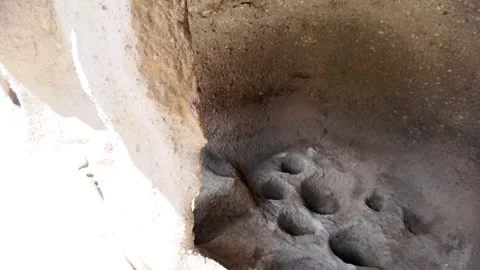 Vardzia rock-cut monastery interior with ancient storage pots carved in stone 動画素材 337913317