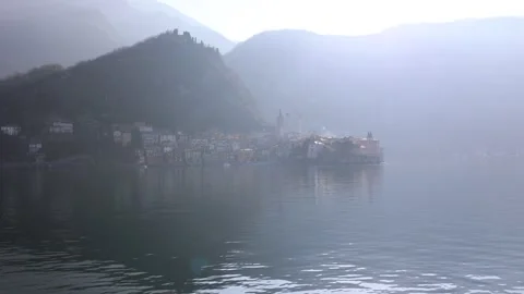 Varenna at Dawn with Sun Rays over Lake Como Stock Footage 313563118