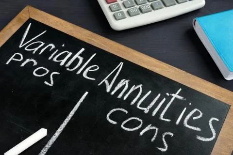 Variable Annuities pros and cons written on a blackboard. Stock Photos