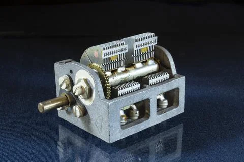 The variable capacitor is lying on the table with the reflection Stock Photos