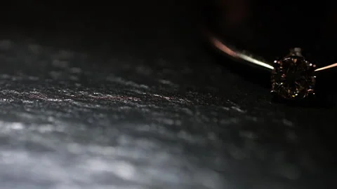 Variable lighting of a gold ring with a diamond. Stock Footage 310226926