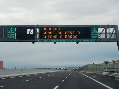 Variable message sign displaying winter driving obligation on A4 motorway Stock-Fotos