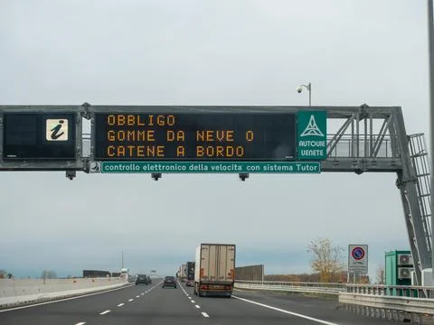Variable message sign showing winter tire obligation on Italian highway A4 Stock-Fotos