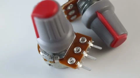 Variable resistor has a scale-factor (potentiometer, pot resistor, adjustable), Stock Footage 129770596
