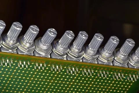 Variable resistors in a very compact housing on a circuit board allow very co Stock Photos