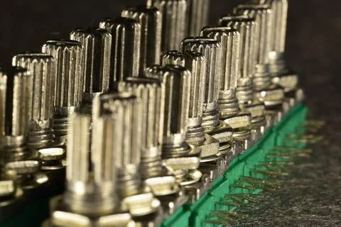 Variable single-turn carbon twin resistors in a row of twos on a desktop. Rea 스톡 사진