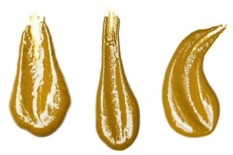 Variation of golden acrylic stain elements with brush and paint texture han.. Foto stock