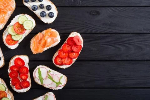 Variation of toast with fruit , vegetable and salmon Stock Photos