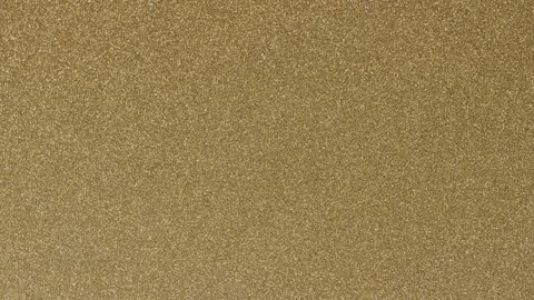 Variations of Color Changing Gold Glitter Background with a Shimmer Pattern Stock Footage 323859606