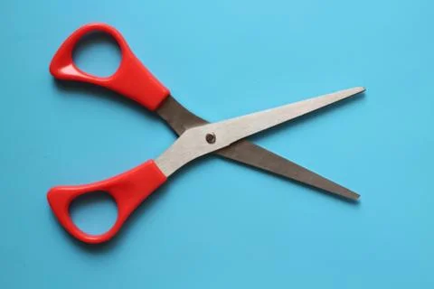 Variations of layouts of stationery items, scissors on a colored background Stock Photos