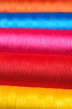 Varicolored spools thread macro Stock Photos