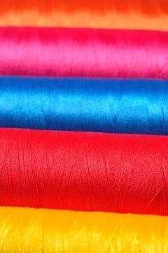 Varicolored spools thread macro Foto stock