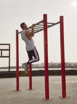 Varied functional training with elastic bands outdoors 写真素材