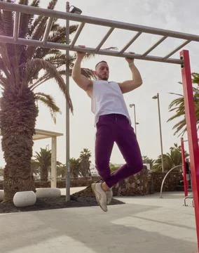 Varied functional training with elastic bands outdoors 写真素材