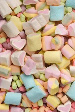 Variegated multicolor marshmallows background close-up top view. Stock-Fotos