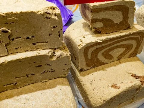 Varieties of halva blocks displayed together Stock Photos