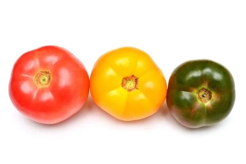Varieties of tomatoes isolated on white background. Assorted tomato is yell.. Stock Photos