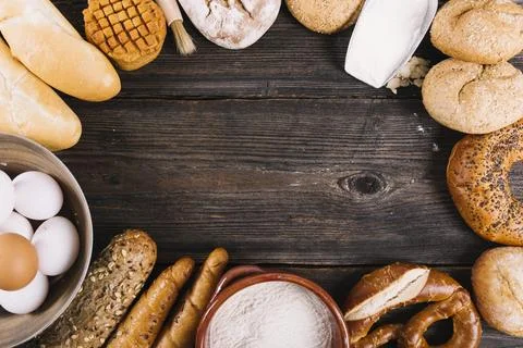 Variety baked breads table with space text Stock Photos