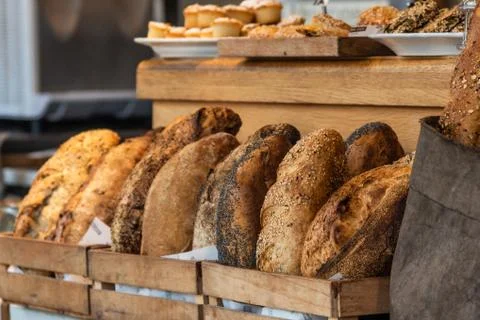 Variety of bread on a stand of a bakery Foto stock