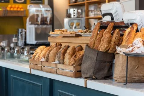 Variety of bread on a stand of a bakery 写真素材