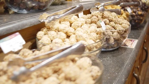 Variety of chocolate sweets in belgium tourist shop Stock Footage 110924200