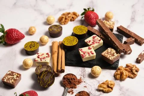 A variety of chocolates on a light background Foto stock