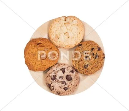 Variety of cookies in bamboo plate isolated on white background Stock Photos