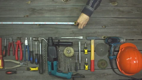 A variety of electro and hand tools. Slow motion. Top view. Video stock 121872464