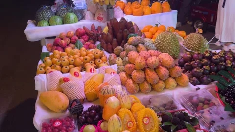 Variety of exotic tropical fruit displayed for sale Stockbeeldmateriaal 336255103
