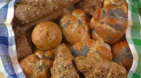 Variety of fresh bread on sacking Stock Footage 61366434