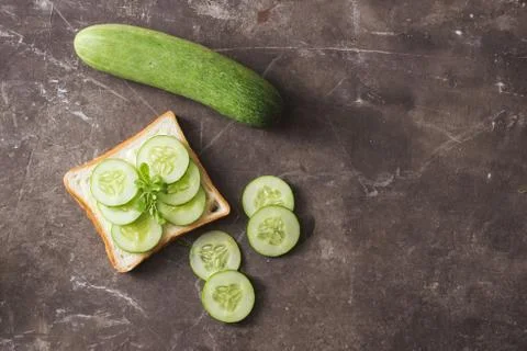 A variety of fruit and bread in a dark background Stock Photos
