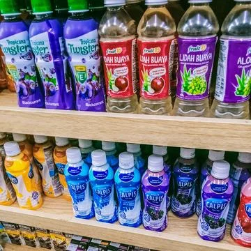 A variety of fruit flavored drinks Stock Photos