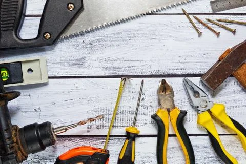Variety of hand tools on work desk Stock Photos