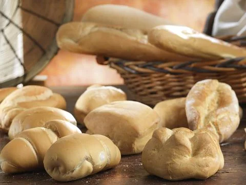Variety of handmade bread On a rustic backdrop Stock Photos