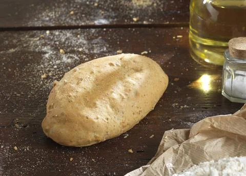 Variety of handmade bread On a rustic backdrop Stock Photos